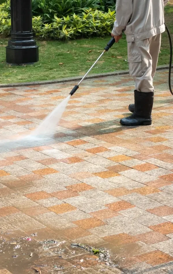 tsunami pressure washing cleaning a driveway in hoover al